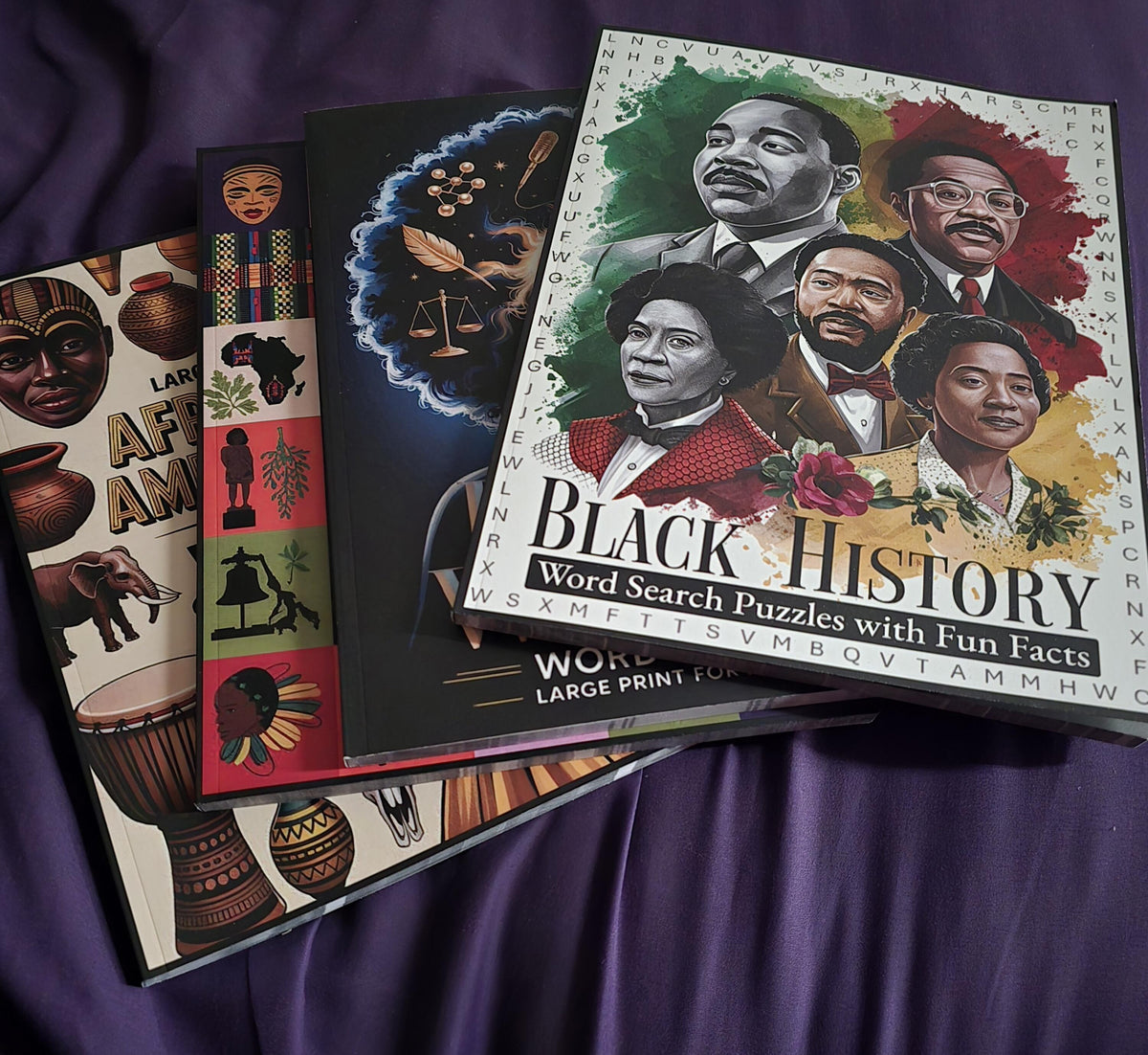 Four Imani Oliver puzzle books fanned out, photo from customer Laureen