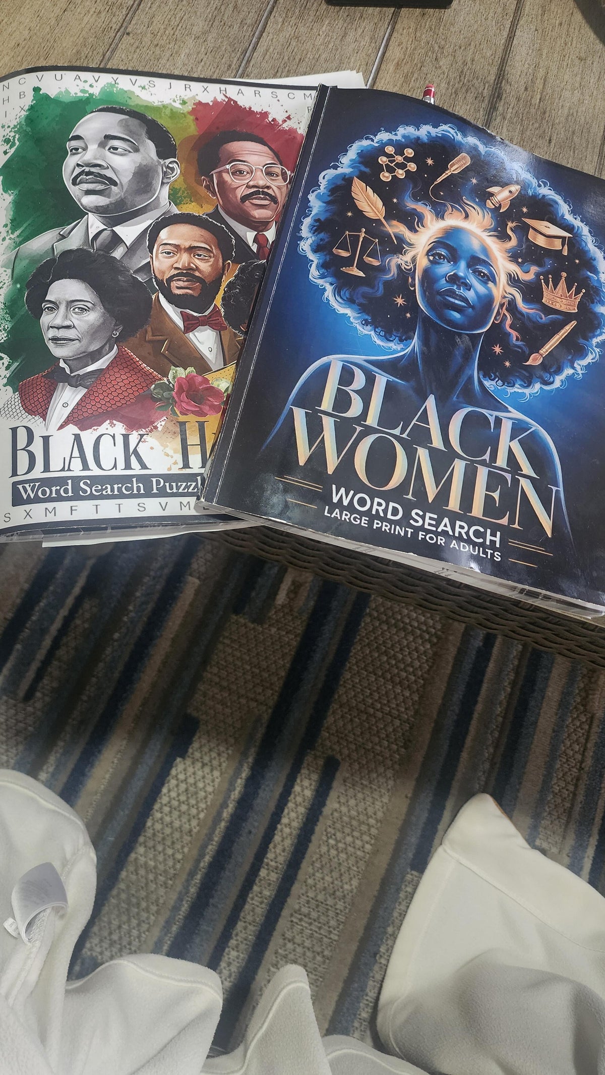 Martha's two Imani Oliver puzzle books on a table